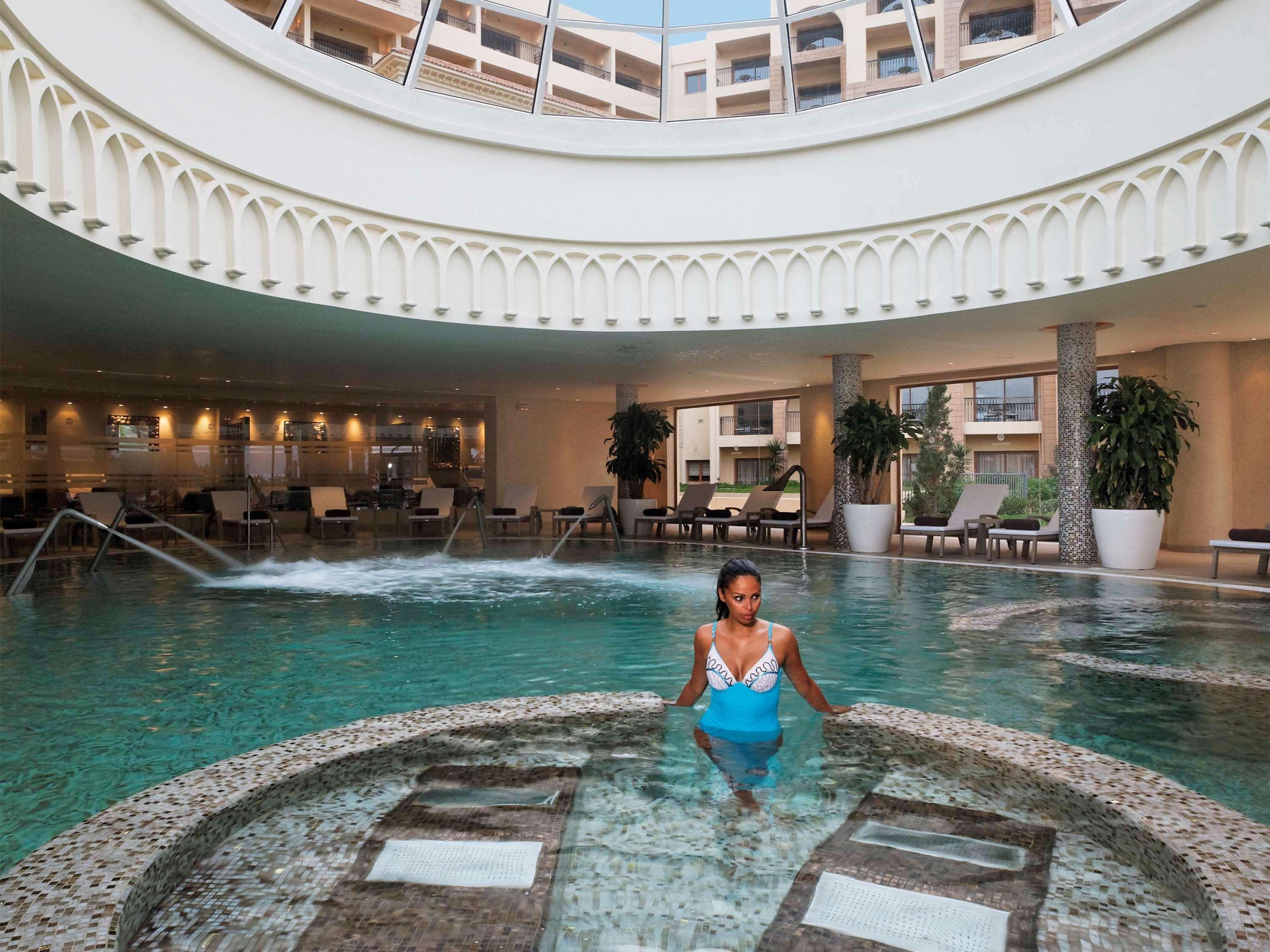 苏赛瑞享温泉水疗度假村 苏塞 外观 照片 The pool at the Hilton Mauritius Resort
